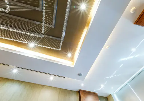 Duplex false ceiling, lighting, and custom furniture design